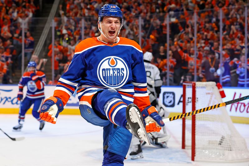 Apr 22, 2024; Edmonton, Alberta, CAN; Edmonton Oilers forward Zach Hyman (18) celebrates after scoring a goal during the first period against the Los Angeles Kings in game one of the first round of the 2024 Stanley Cup Playoffs at Rogers Place. Mandatory Credit: Perry Nelson-USA TODAY Sports