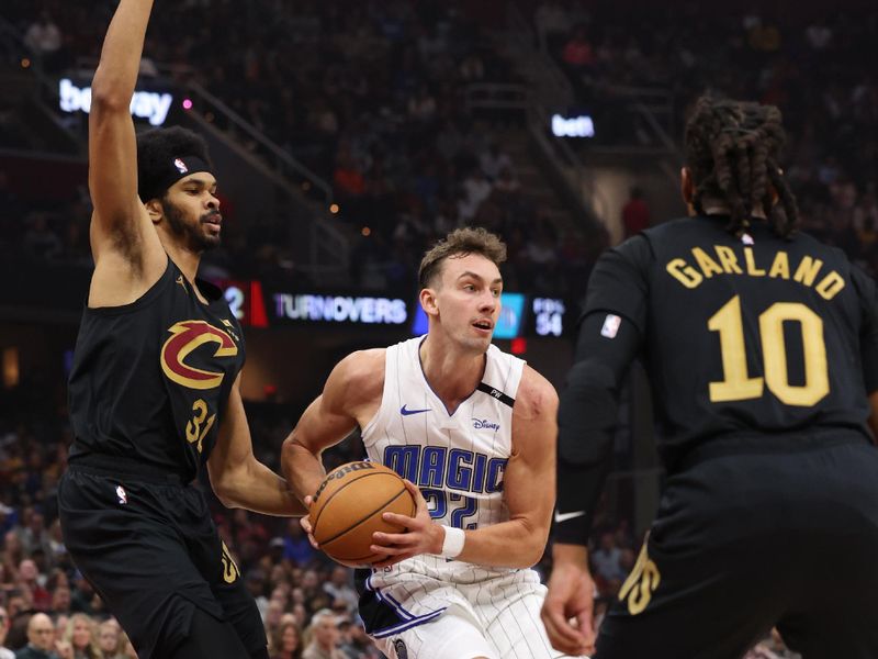 CLEVELAND, OH - NOVEMBER 1: Moritz Wagner #21 of the Orlando Magic drives to the basket during the game against the Cleveland Cavaliers on November 1, 2024 at Rocket Mortgage FieldHouse in Cleveland, Ohio. NOTE TO USER: User expressly acknowledges and agrees that, by downloading and/or using this Photograph, user is consenting to the terms and conditions of the Getty Images License Agreement. Mandatory Copyright Notice: Copyright 2024 NBAE (Photo by  Lauren Leigh Bacho/NBAE via Getty Images)