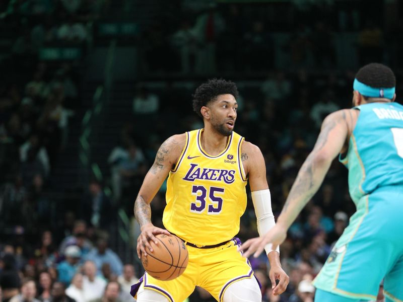 CHARLOTTE, NC - FEBRUARY 5: Christian Wood #35 of the Los Angeles Lakers handles the ball during the game  against the Charlotte Hornets on February 5, 2024 at Spectrum Center in Charlotte, North Carolina. NOTE TO USER: User expressly acknowledges and agrees that, by downloading and or using this photograph, User is consenting to the terms and conditions of the Getty Images License Agreement.  Mandatory Copyright Notice:  Copyright 2024 NBAE (Photo by Brock Williams-Smith/NBAE via Getty Images)