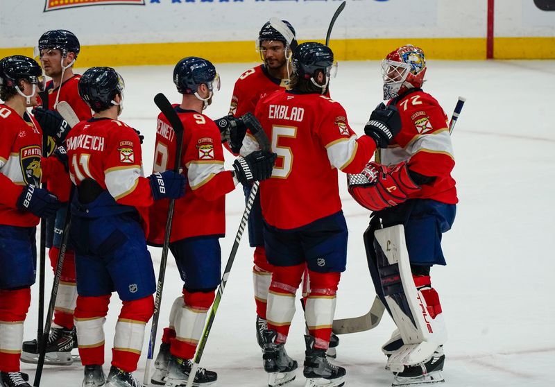 Dec 29, 2025; Sunrise, Florida, USA; Florida Panthers goaltender Sergei Bobrovsky (72) is congratulated by defenseman Aaron Ekblad (5)  after defeating the Washington Capitals at Amerant Bank Arena. Mandatory Credit: Jeff Romance-Imagn Images