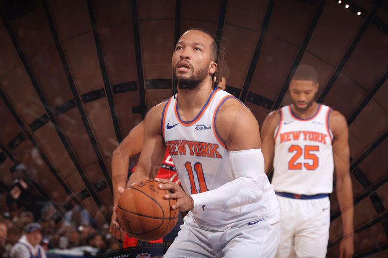 NEW YORK, NY - NOVEMBER 18: (EDITORS NOTE: This image was taken using a multiple exposure): Jalen Brunson #11 of the New York Knicks shoots a free throw during the game against the Washington Wizards on November 18, 2024 at Madison Square Garden in New York City, New York.  NOTE TO USER: User expressly acknowledges and agrees that, by downloading and or using this photograph, User is consenting to the terms and conditions of the Getty Images License Agreement. Mandatory Copyright Notice: Copyright 2024 NBAE  (Photo by Nathaniel S. Butler/NBAE via Getty Images)