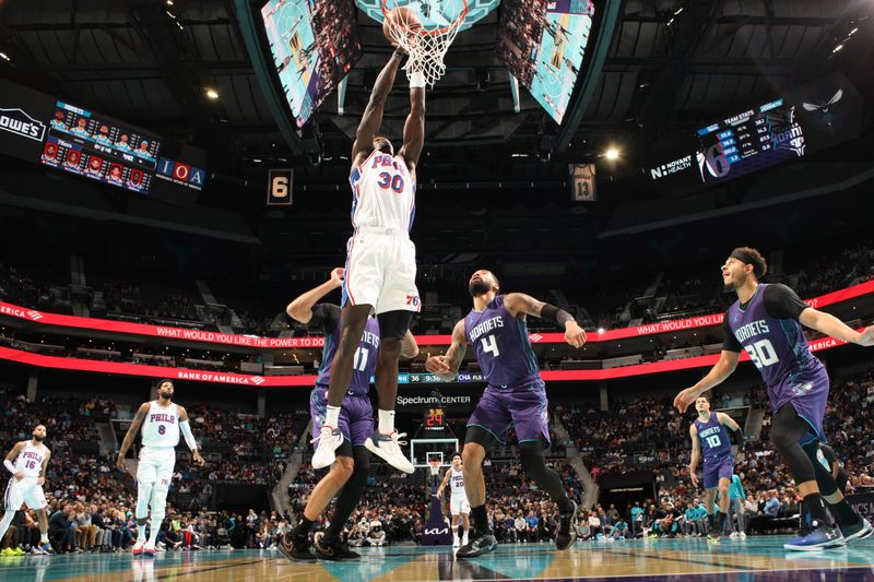 CHARLOTTE, NC - DECEMBER 3: Adem Bona #30 of the Philadelphia 76ers dunks the ball during the game against the Charlotte Hornets during an NBA Emirates Cup game on December 3, 2024 at Spectrum Center in Charlotte, North Carolina. NOTE TO USER: User expressly acknowledges and agrees that, by downloading and or using this photograph, User is consenting to the terms and conditions of the Getty Images License Agreement. Mandatory Copyright Notice: Copyright 2024 NBAE (Photo by Kent Smith/NBAE via Getty Images)