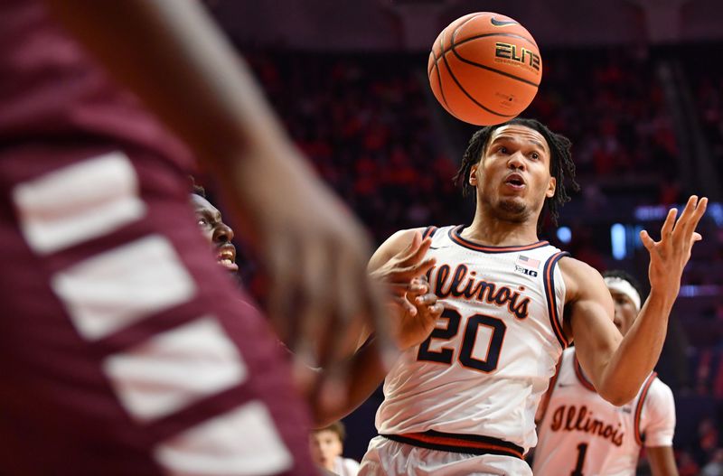 Dec 17, 2022; Champaign, Illinois, USA;  Illinois Fighting Illini guard Ty Rodgers (20) tries to get a handle on the ball against the Alabama A&M Bulldogs during the first half at State Farm Center. Mandatory Credit: Ron Johnson-USA TODAY Sports