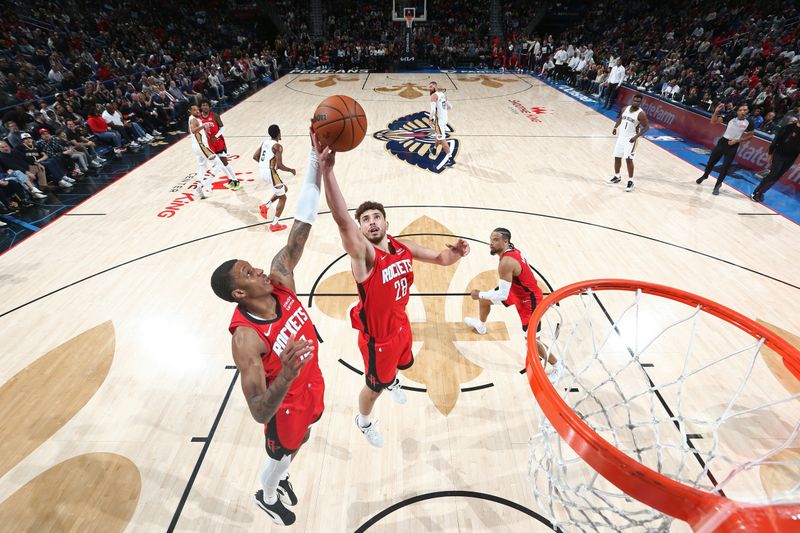 NEW ORLEANS, LA - FEBRUARY 22: Alperen Sengun #28 of the Houston Rockets grabs a rebound during the game against the New Orleans Pelicans on February 22, 2024 at the Smoothie King Center in New Orleans, Louisiana. NOTE TO USER: User expressly acknowledges and agrees that, by downloading and or using this Photograph, user is consenting to the terms and conditions of the Getty Images License Agreement. Mandatory Copyright Notice: Copyright 2024 NBAE (Photo by Layne Murdoch Jr./NBAE via Getty Images)