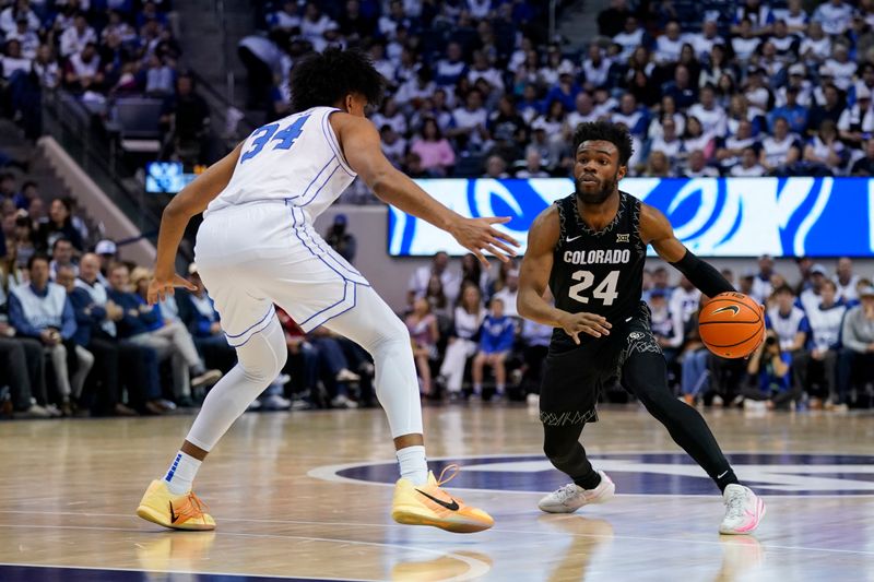 Feb 14, 2026; Provo, Utah, USA; Barrington Hargress (24) of the Colorado Buffaloes controls the ball during the second half against the BYU Cougars at the Marriott Center. Mandatory Credit: Aaron Baker-Imagn Images