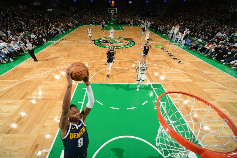 BOSTON, MA - JANUARY 19:  Peyton Watson #8 of the Denver Nuggets drives to the basket during the game against the Boston Celtics on January 19, 2024 at the TD Garden in Boston, Massachusetts. NOTE TO USER: User expressly acknowledges and agrees that, by downloading and or using this photograph, User is consenting to the terms and conditions of the Getty Images License Agreement. Mandatory Copyright Notice: Copyright 2024 NBAE  (Photo by Brian Babineau/NBAE via Getty Images)