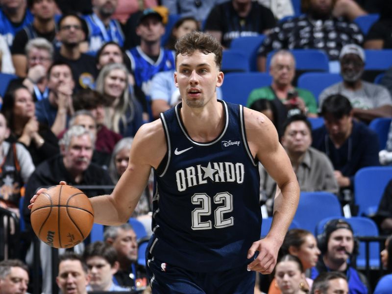 ORLANDO, FL - MARCH 21: Franz Wagner #22 of the Orlando Magic dribbles the ball during the game against the New Orleans Pelicans on March 21, 2024 at Amway Center in Orlando, Florida. NOTE TO USER: User expressly acknowledges and agrees that, by downloading and or using this photograph, User is consenting to the terms and conditions of the Getty Images License Agreement. Mandatory Copyright Notice: Copyright 2024 NBAE (Photo by Fernando Medina/NBAE via Getty Images)