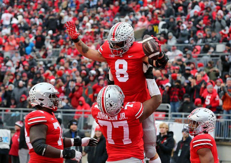 Nov 12, 2022; Columbus, Ohio, USA;  Ohio State Buckeyes tight end Cade Stover (8) and offensive lineman Paris Johnson Jr. (77) celebrate the touchdown during the third quarter against the Indiana Hoosiers at Ohio Stadium. Mandatory Credit: Joseph Maiorana-USA TODAY Sports