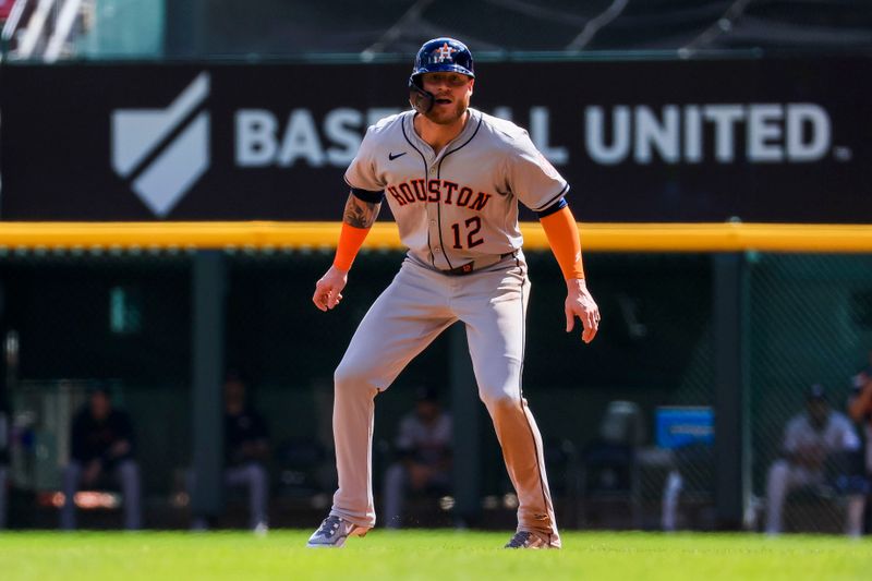 Sep 5, 2024; Cincinnati, Ohio, USA; Houston Astros outfielder Ben Gamel (12) leads off from first in the seventh inning against the Cincinnati Reds at Great American Ball Park. Mandatory Credit: Katie Stratman-Imagn Images