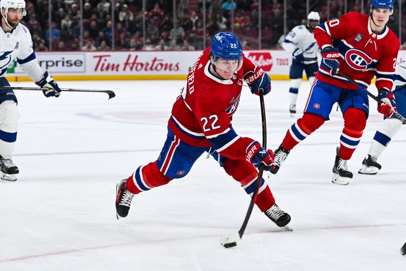 Apr 4, 2024; Montreal, Quebec, CAN; Montreal Canadiens right wing Cole Caufield (22) shoots the puck against the Tampa Bay Lightning during the third period at Bell Centre. Mandatory Credit: David Kirouac-USA TODAY Sports