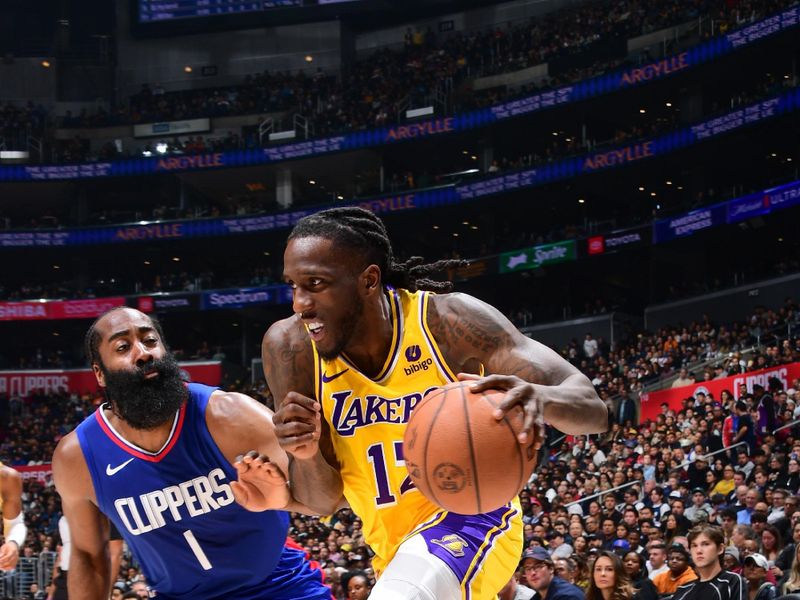 LOS ANGELES, CA - JANUARY 23: Taurean Prince #12 of the Los Angeles Lakers goes to the basket during the game  on January 23, 2024 at Crypto.Com Arena in Los Angeles, California. NOTE TO USER: User expressly acknowledges and agrees that, by downloading and/or using this Photograph, user is consenting to the terms and conditions of the Getty Images License Agreement. Mandatory Copyright Notice: Copyright 2024 NBAE (Photo by Adam Pantozzi/NBAE via Getty Images)