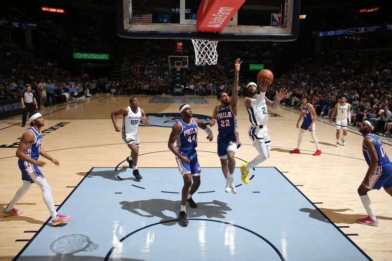 MEMPHIS, TN - APRIL 6: Xavier Tillman #2 of the Memphis Grizzlies drives to the basket during the game against the Philadelphia 76ers on April 6, 2024 at FedExForum in Memphis, Tennessee. NOTE TO USER: User expressly acknowledges and agrees that, by downloading and or using this photograph, User is consenting to the terms and conditions of the Getty Images License Agreement. Mandatory Copyright Notice: Copyright 2024 NBAE (Photo by Joe Murphy/NBAE via Getty Images)