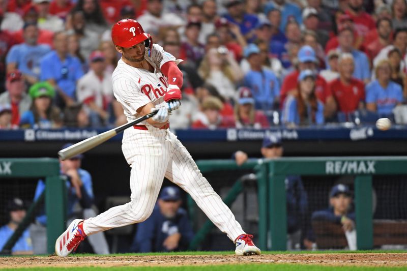 Sep 10, 2024; Philadelphia, Pennsylvania, USA; Philadelphia Phillies shortstop Trea Turner (7) hits a two run home run during the eighth inning against the Tampa Bay Rays at Citizens Bank Park. Mandatory Credit: Eric Hartline-Imagn Images