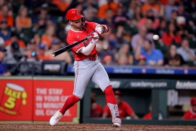 May 20, 2024; Houston, Texas, USA; Los Angeles Angels shortstop Zach Neto (9) hits a home run to left field against the Houston Astros during the sixth inning at Minute Maid Park. Mandatory Credit: Erik Williams-USA TODAY Sports