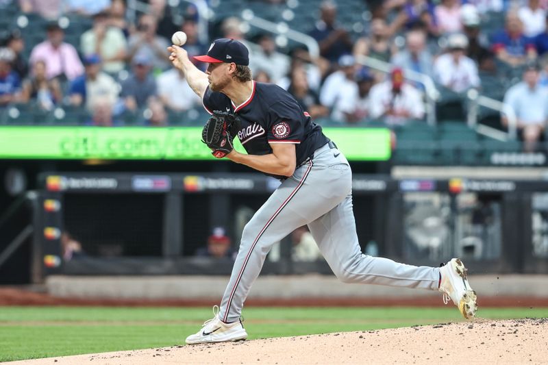 Jul 9, 2024; New York City, New York, USA;  Washington Nationals staring pitcher Jake Irvin (27) pitches in the first inning against the New York Mets at Citi Field. Mandatory Credit: Wendell Cruz-USA TODAY Sports