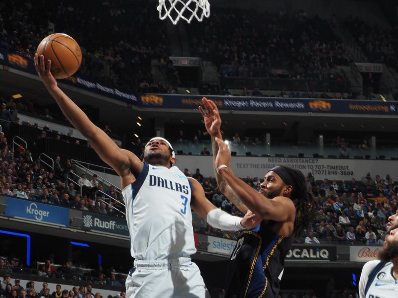 INDIANAPOLIS, IN - MARCH 27: Jaden Hardy #3 of the Dallas Mavericks drives to the basket during the game against the Indiana Pacers on March 27, 2023 at Gainbridge Fieldhouse in Indianapolis, Indiana. NOTE TO USER: User expressly acknowledges and agrees that, by downloading and or using this Photograph, user is consenting to the terms and conditions of the Getty Images License Agreement. Mandatory Copyright Notice: Copyright 2023 NBAE (Photo by Ron Hoskins/NBAE via Getty Images)