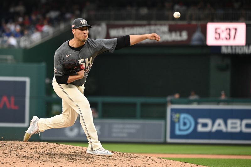 Aug 31, 2024; Washington, District of Columbia, USA; Washington Nationals relief pitcher Robert Garcia (61) throws a pitch against the Chicago Cubs during the sixth inning at Nationals Park. Mandatory Credit: Rafael Suanes-USA TODAY Sports