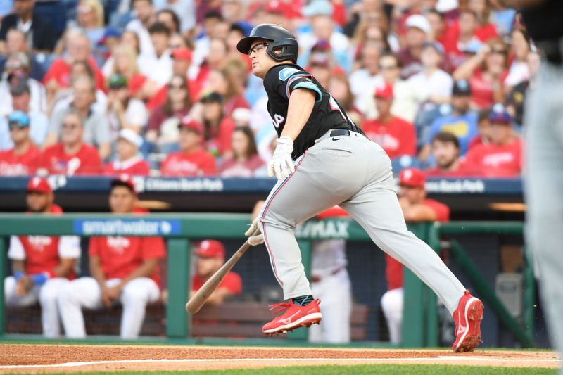 Aug 13, 2024; Philadelphia, Pennsylvania, USA; Miami Marlins first base Jonah Bride (41) hits an RBI single against the Philadelphia Phillies during the first inning at Citizens Bank Park. Mandatory Credit: Eric Hartline-USA TODAY Sports