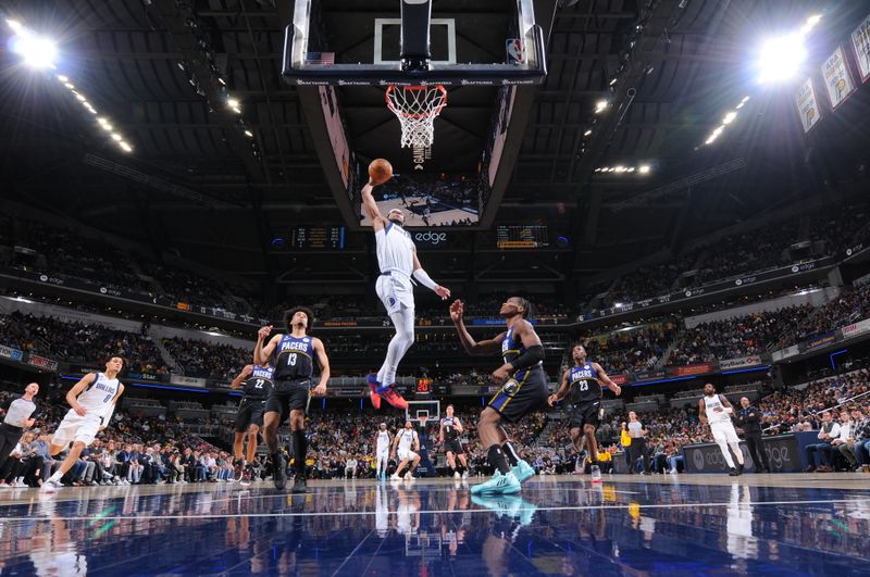 INDIANAPOLIS, IN - MARCH 27: Jaden Hardy #3 of the Dallas Mavericks drives to the basket during the game against the Indiana Pacers on March 27, 2023 at Gainbridge Fieldhouse in Indianapolis, Indiana. NOTE TO USER: User expressly acknowledges and agrees that, by downloading and or using this Photograph, user is consenting to the terms and conditions of the Getty Images License Agreement. Mandatory Copyright Notice: Copyright 2023 NBAE (Photo by Ron Hoskins/NBAE via Getty Images)