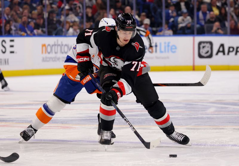 Nov 1, 2024; Buffalo, New York, USA;  Buffalo Sabres center Ryan McLeod (71) skates up ice with the puck during the second period against the New York Islanders at KeyBank Center. Mandatory Credit: Timothy T. Ludwig-Imagn Images