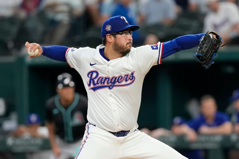 May 29, 2024; Arlington, Texas, USA; Texas Rangers starting pitcher Dane Dunning (33) delivers to the Arizona Diamondbacks during the first inning at Globe Life Field. Mandatory Credit: Jim Cowsert-USA TODAY Sports