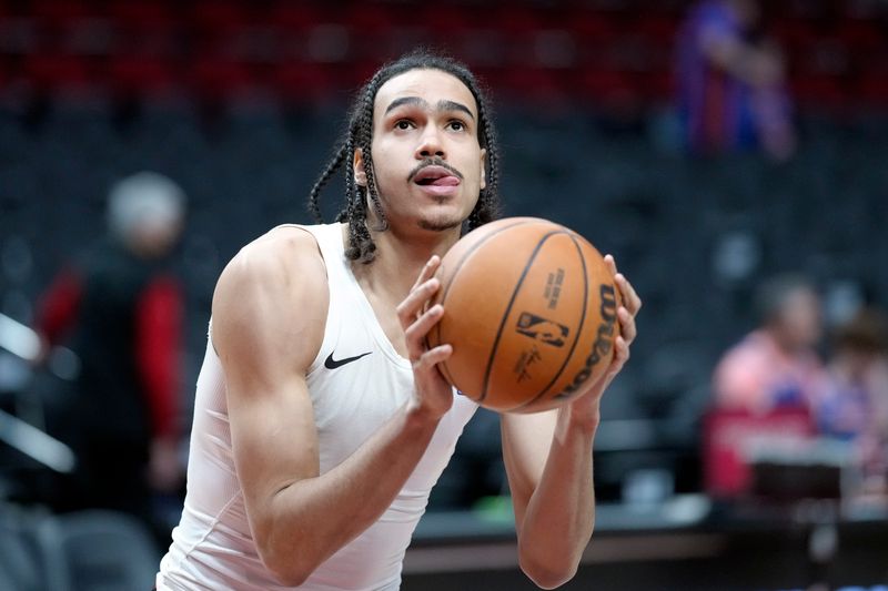 PORTLAND, OREGON - MARCH 14: Dalano Banton #5 of the Portland Trail Blazers warms up prior to a game against the New York Knicks at Moda Center on March 14, 2024 in Portland, Oregon. NOTE TO USER: User expressly acknowledges and agrees that, by downloading and or using this photograph, User is consenting to the terms and conditions of the Getty Images License Agreement.  (Photo by Soobum Im/Getty Images)