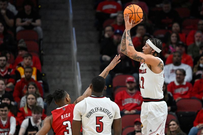 Jan 13, 2024; Louisville, Kentucky, USA;  Louisville Cardinals guard Tre White (22) shoots the ball against North Carolina State Wolfpack guard MJ Rice (3) during the first half at KFC Yum! Center. Mandatory Credit: Jamie Rhodes-USA TODAY Sports