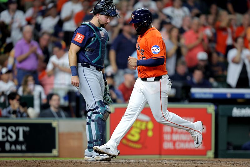 May 23, 2025; Houston, Texas, USA; Houston Astros third baseman Isaac Paredes (15) crosses home plate to score a run against the Seattle Mariners during the fifth inning at Daikin Park. Mandatory Credit: Erik Williams-Imagn Images