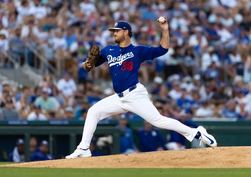 Mar 12, 2026; Phoenix, Arizona, USA; Los Angeles Dodgers pitcher Cole Irvin against the Cincinnati Reds during a spring training game at Camelback Ranch-Glendale. Mandatory Credit: Mark J. Rebilas-Imagn Images