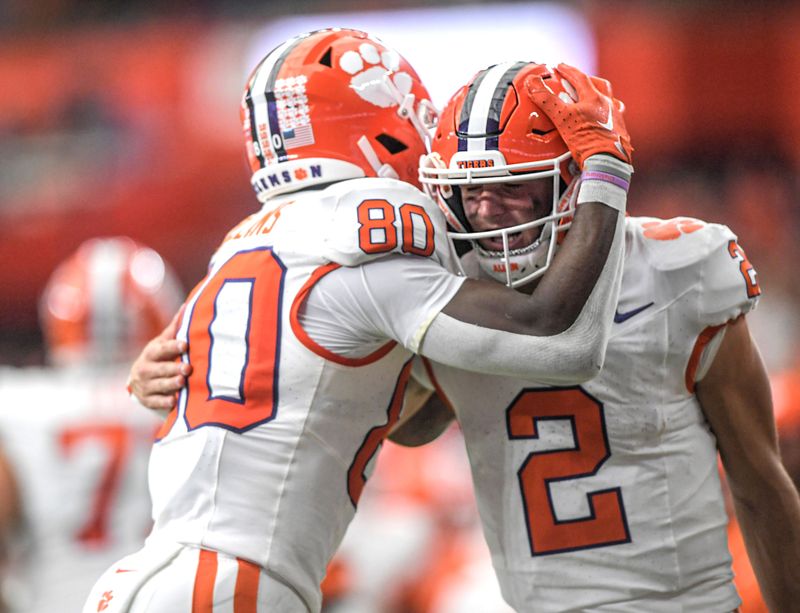 Sep 30, 2023; Syracuse, New York, USA; Clemson Tigers wide receiver Beaux Collins (80) celebrates his touchdown against the Syracuse Orange during the second quarter at JMA Wireless Dome Mandatory Credit: Ken Ruinard-USA TODAY Sports

