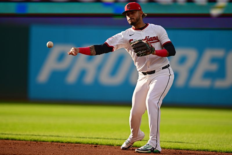 Apr 21, 2025; Cleveland, Ohio, USA; Cleveland Guardians second baseman Gabriel Arias (13) throws to first for an out during the third inning against the New York Yankees at Progressive Field. Mandatory Credit: David Dermer-Imagn Images
