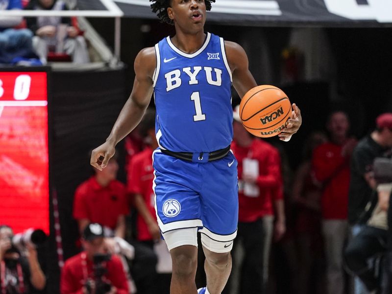 Jan 10, 2026; Salt Lake City, Utah, USA; BYU Cougars guard Robert Wright III (1) dribbles the ball during the first half against the Utah Utes at Jon M. Huntsman Center. Mandatory Credit: Aaron Baker-Imagn Images