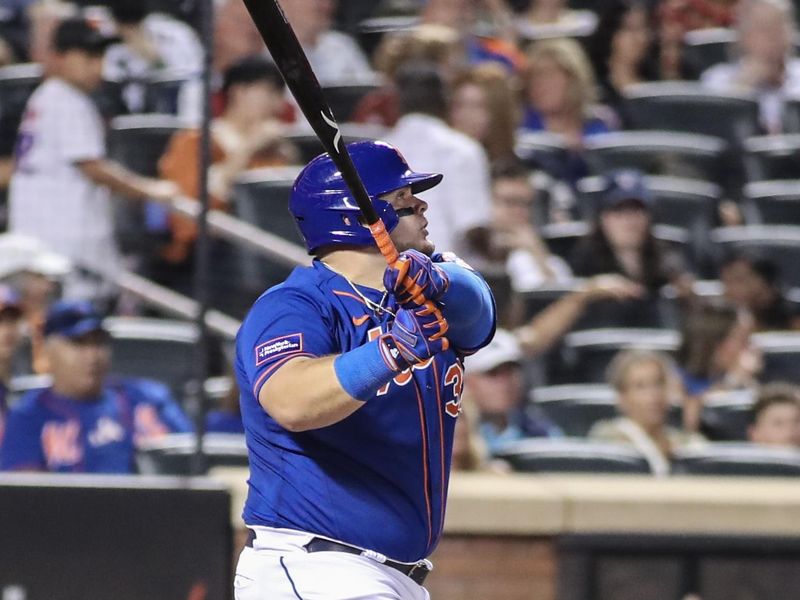 Aug 26, 2023; New York City, New York, USA;  New York Mets designated hitter Daniel Vogelbach (32) hits a solo home run in the sixth inning against the Los Angeles Angels at Citi Field. Mandatory Credit: Wendell Cruz-USA TODAY Sports