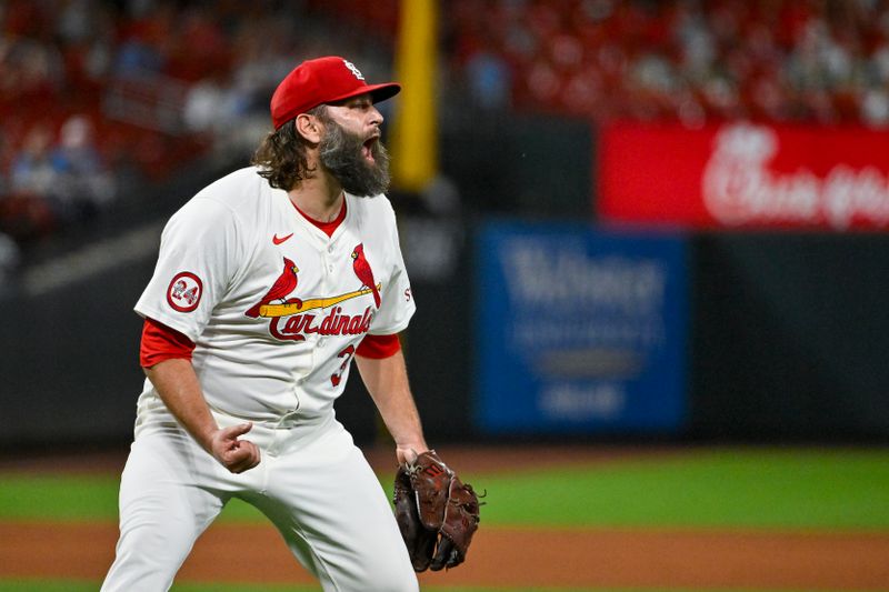 Sep 17, 2024; St. Louis, Missouri, USA;  St. Louis Cardinals starting pitcher Lance Lynn (31) reacts after inning ending double play against the Pittsburgh Pirates during the fifth inning at Busch Stadium. Mandatory Credit: Jeff Curry-Imagn Images