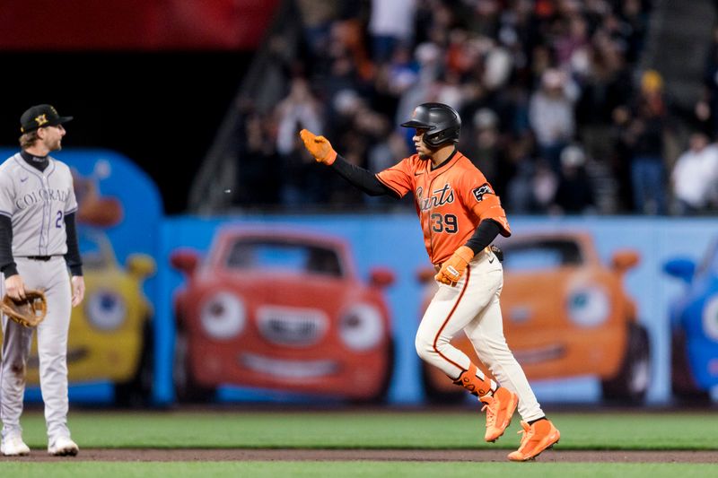 May 17, 2024; San Francisco, California, USA; San Francisco Giants second baseman Thairo Estrada (39) gestures as he runs the bases after hitting a three-run home run against the Colorado Rockies during the fifth inning at Oracle Park. Mandatory Credit: John Hefti-USA TODAY Sports