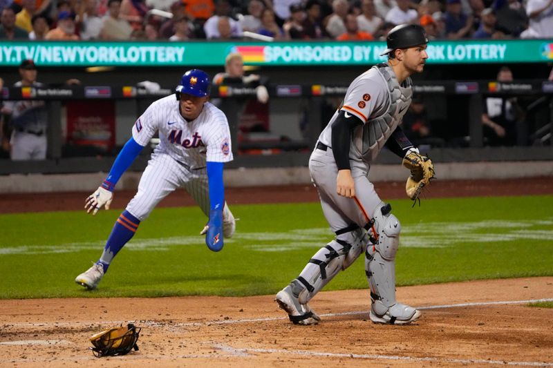 Jul 2, 2023; New York City, New York, USA; New York Mets center fielder Brandon Nimmo (9) scores a run after New York Mets left fielder Tommy Pham (28) hit a RBI double against the San Francisco Giants during the fourth inning at Citi Field. Mandatory Credit: Gregory Fisher-USA TODAY Sports