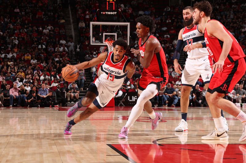 HOUSTON, TX - NOVEMBER 11: Jordan Poole #13 of the Washington Wizards dribbles the ball during the game against the Houston Rockets on November 11, 2024 at the Toyota Center in Houston, Texas. NOTE TO USER: User expressly acknowledges and agrees that, by downloading and or using this photograph, User is consenting to the terms and conditions of the Getty Images License Agreement. Mandatory Copyright Notice: Copyright 2024 NBAE (Photo by KeShawn Ennis/NBAE via Getty Images)