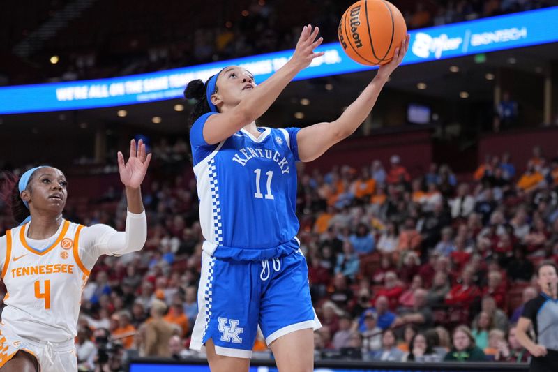 Mar 3, 2023; Greenville, SC, USA; Kentucky Wildcats guard Jada Walker (11) shoots the ball over Tennessee Lady Vols guard Jordan Walker (4) in the first quarter at Bon Secours Wellness Arena. Mandatory Credit: David Yeazell-USA TODAY Sports