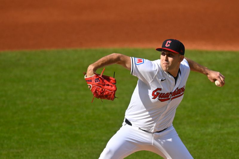 Oct 12, 2024; Cleveland, Ohio, USA; Cleveland Guardians starting pitcher Matthew Boyd (16) pitches in the first inning against the Detroit Tigers during game five of the ALDS for the 2024 MLB Playoffs at Progressive Field. Mandatory Credit: David Richard-Imagn Images