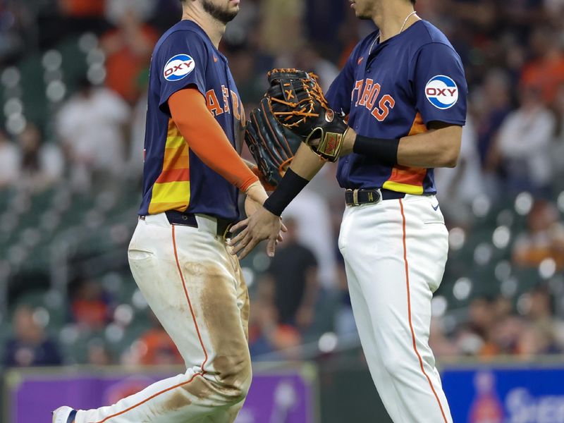 May 15, 2024; Houston, Texas, USA; Houston Astros right fielder Kyle Tucker (30) and shortstop Jeremy Pena (3) celebrate the win after defeating the Oakland Athletics at Minute Maid Park. Mandatory Credit: Thomas Shea-USA TODAY Sports