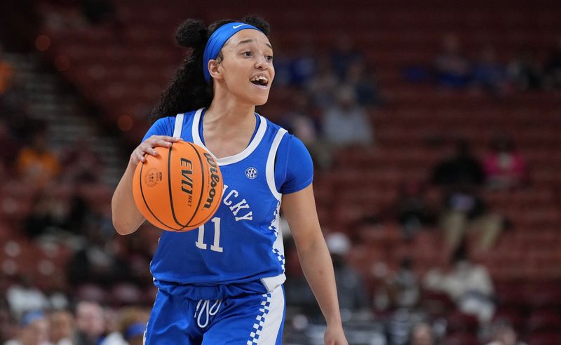 Mar 3, 2023; Greenville, SC, USA; Kentucky Wildcats guard Jada Walker (11) brings the ball up court in the first quarter against the Tennessee Lady Vols at Bon Secours Wellness Arena. Mandatory Credit: David Yeazell-USA TODAY Sports