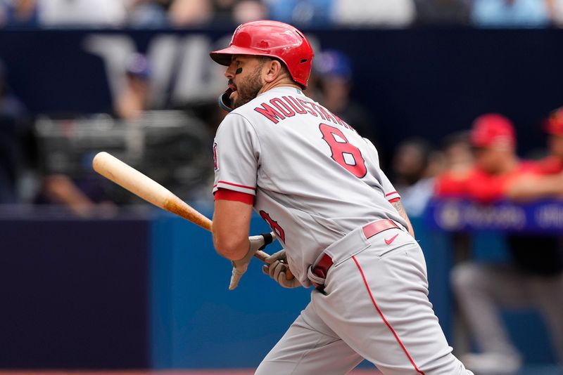 Jul 30, 2023; Toronto, Ontario, CAN; Los Angeles Angels first baseman Mike Moustakas (8) hits a single against the Toronto Blue Jays during the third inning at Rogers Centre. Mandatory Credit: John E. Sokolowski-USA TODAY Sports