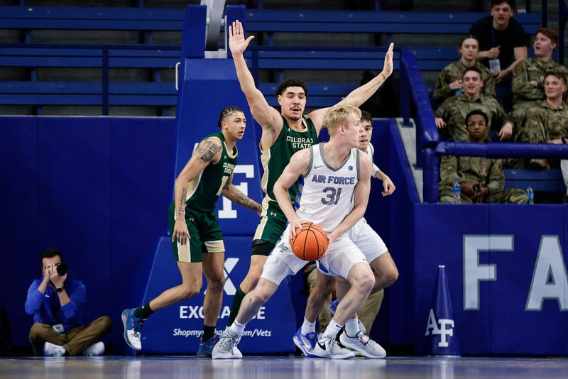 Mar 9, 2024; Colorado Springs, Colorado, USA; Air Force Falcons forward Rytis Petraitis (31) controls the ball as Colorado State Rams forward Joel Scott (1) defends in the first half at Clune Arena. Mandatory Credit: Isaiah J. Downing-USA TODAY Sports