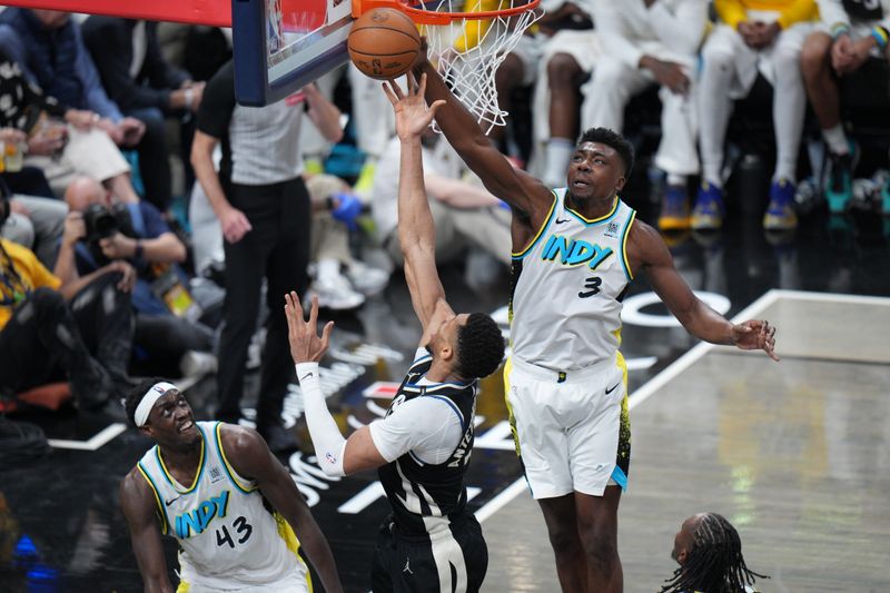 INDIANAPOLIS, IN - APRIL 19: Thomas Bryant #3 of the Indiana Pacers blocks shots during the game against the Milwaukee Bucks during round 1 Game 1 of the 2025 NBA Playoffs on April 19, 2025 at Gainbridge Fieldhouse in Indianapolis, Indiana. NOTE TO USER: User expressly acknowledges and agrees that, by downloading and or using this Photograph, user is consenting to the terms and conditions of the Getty Images License Agreement. Mandatory Copyright Notice: Copyright 2025 NBAE (Photo by A.J. Mast/NBAE via Getty Images)