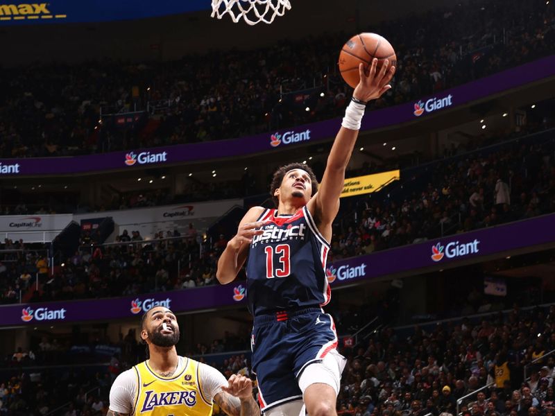 WASHINGTON, DC -? APRIL 4: Jordan Poole #13 of the Washington Wizards drives to the basket during the game against the Los Angeles Lakers on April 4, 2024 at Capital One Arena in Washington, DC. NOTE TO USER: User expressly acknowledges and agrees that, by downloading and or using this Photograph, user is consenting to the terms and conditions of the Getty Images License Agreement. Mandatory Copyright Notice: Copyright 2024 NBAE (Photo by Kenny Giarla/NBAE via Getty Images)