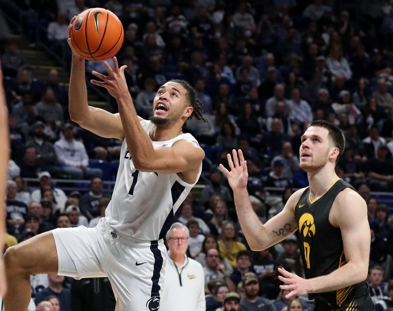 Jan 1, 2023; University Park, Pennsylvania, USA; Penn State Nittany Lions guard/forward Seth Lundy (1) drives the ball to the basket during the first half against the Iowa Hawkeyes at Bryce Jordan Center. Penn State defeated Iowa 83-79. Mandatory Credit: Matthew OHaren-USA TODAY Sports