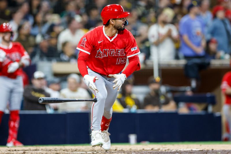 May 13, 2025; San Diego, California, USA; Los Angeles Angels left fielder Matthew Lugo (15) tosses his bat after hitting a two run home run during the seventh inning against the San Diego Padres at Petco Park. Mandatory Credit: David Frerker-Imagn Images