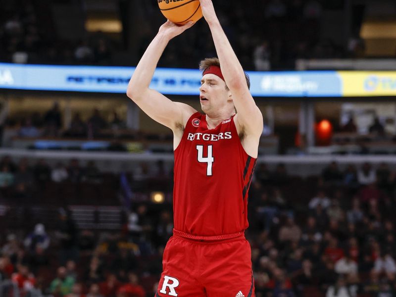 Mar 10, 2023; Chicago, IL, USA; Rutgers Scarlet Knights guard Paul Mulcahy (4) shoots against the Purdue Boilermakers during the first half at United Center. Mandatory Credit: Kamil Krzaczynski-USA TODAY Sports