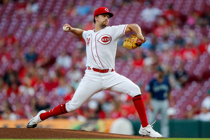 Sep 5, 2023; Cincinnati, Ohio, USA; Cincinnati Reds starting pitcher Connor Phillips (34) pitches against the Seattle Mariners in the first inning at Great American Ball Park. Mandatory Credit: Katie Stratman-USA TODAY Sports