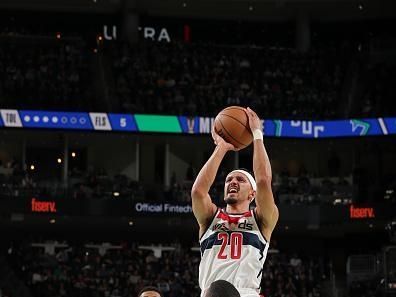 MILWAUKEE, WI - NOVEMBER 24: Landry Shamet #20 of the Washington Wizards shoots the ball during the game against the Milwaukee Bucks during the In-Season Tournament on November 24, 2023 at the Fiserv Forum Center in Milwaukee, Wisconsin. NOTE TO USER: User expressly acknowledges and agrees that, by downloading and or using this Photograph, user is consenting to the terms and conditions of the Getty Images License Agreement. Mandatory Copyright Notice: Copyright 2023 NBAE (Photo by Gary Dineen/NBAE via Getty Images).